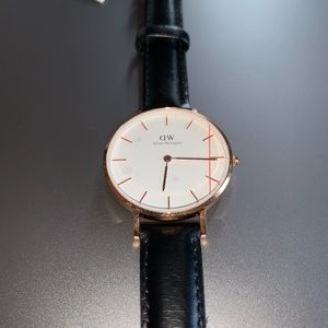 Daniel Wellington black leather watch.